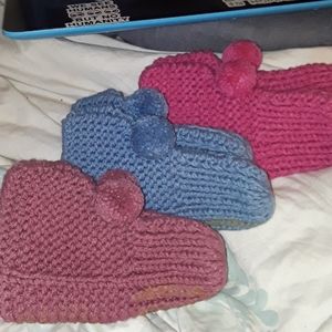 Blue pair crochet slippers.  Blue Avail.